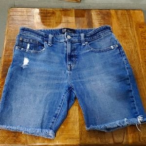 Gap, women's 9" distressed Bermuda shorts.